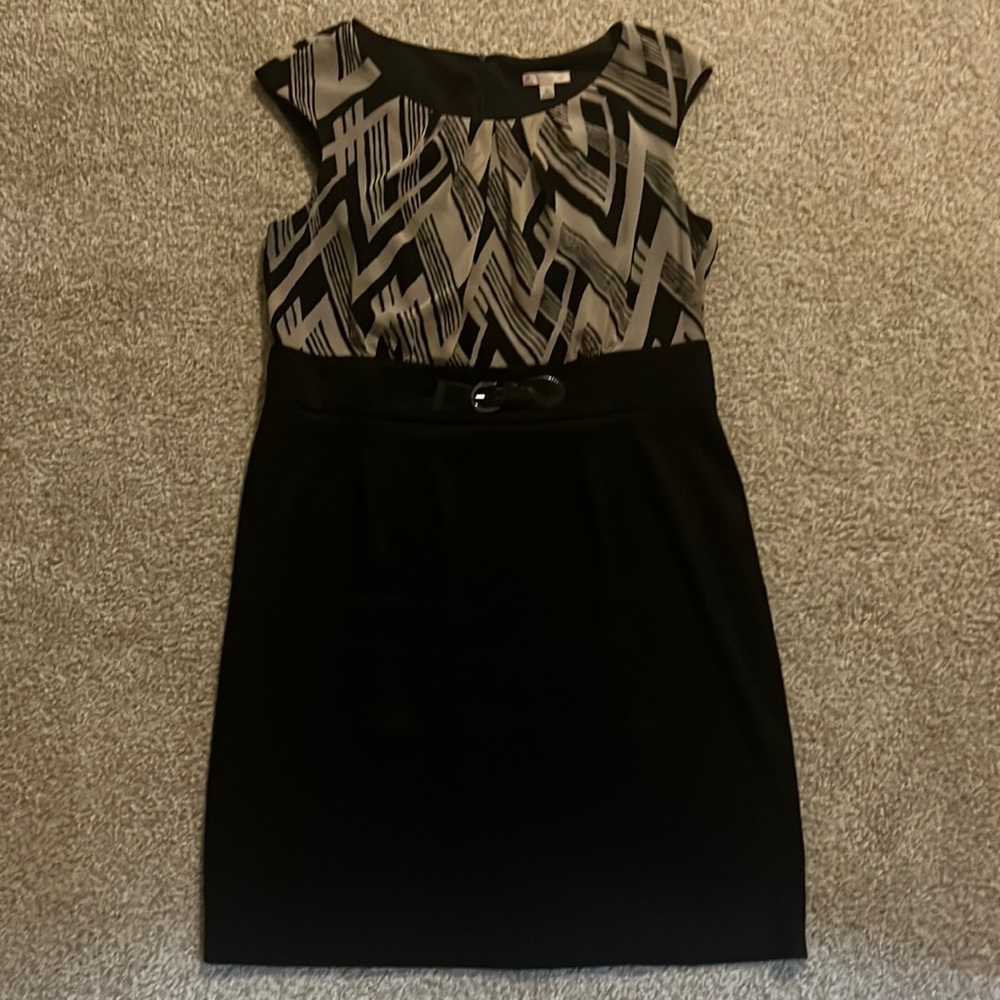 Dress barn careeer dress. Black bottom with faux belt detail.   Blouse top.